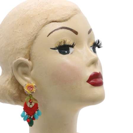 Head with red mexican earrings