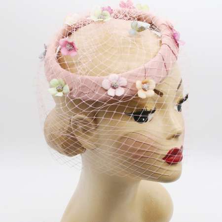 round hat in pink with veil