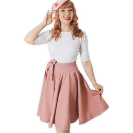 women with pink circle skirt