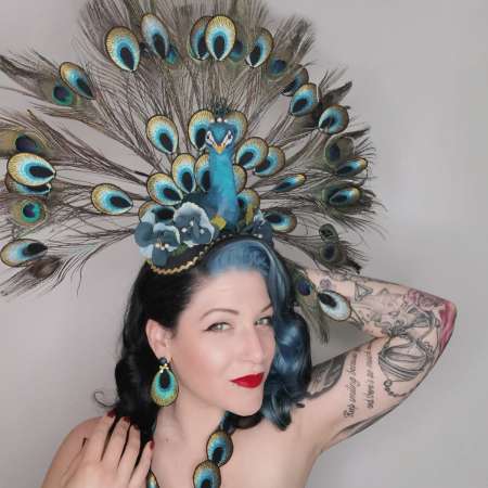 Girl with peacock earrings