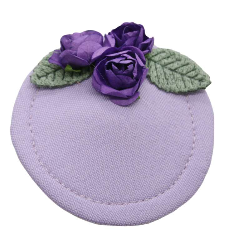 Purple mini fascinator with roses