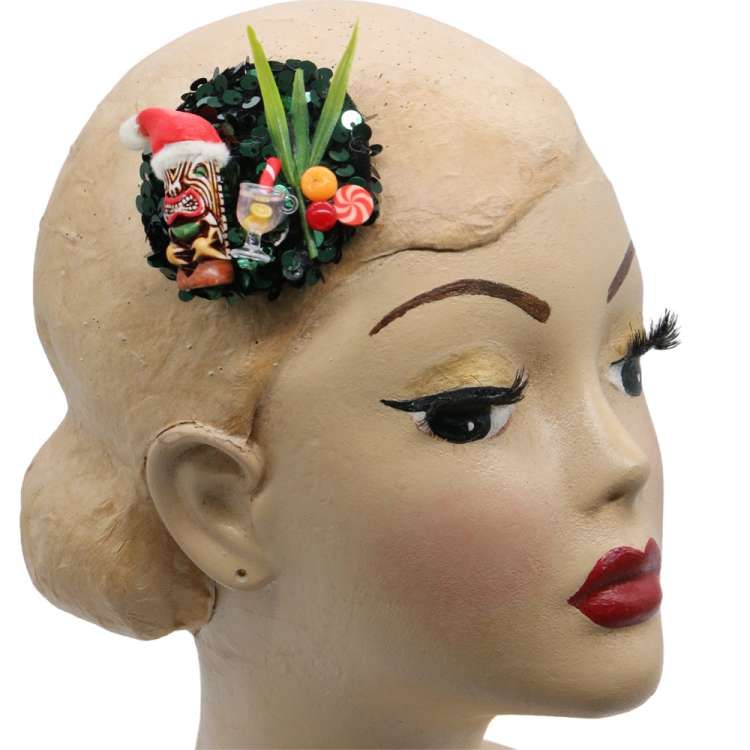 head with xmas tiki fascinator