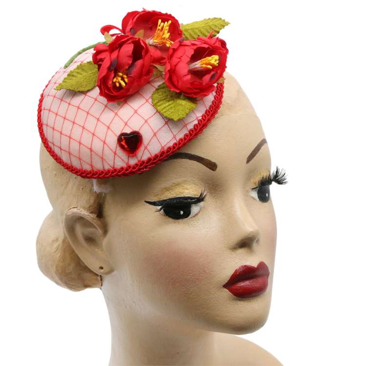 Pink vintage style fascinator with roses
