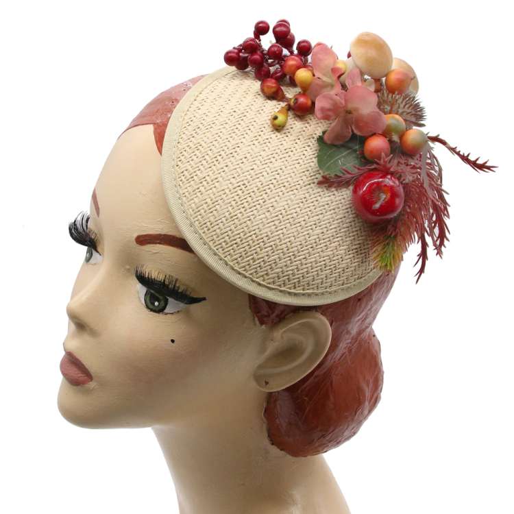 Straw fascinator with autumn berries fruit brown