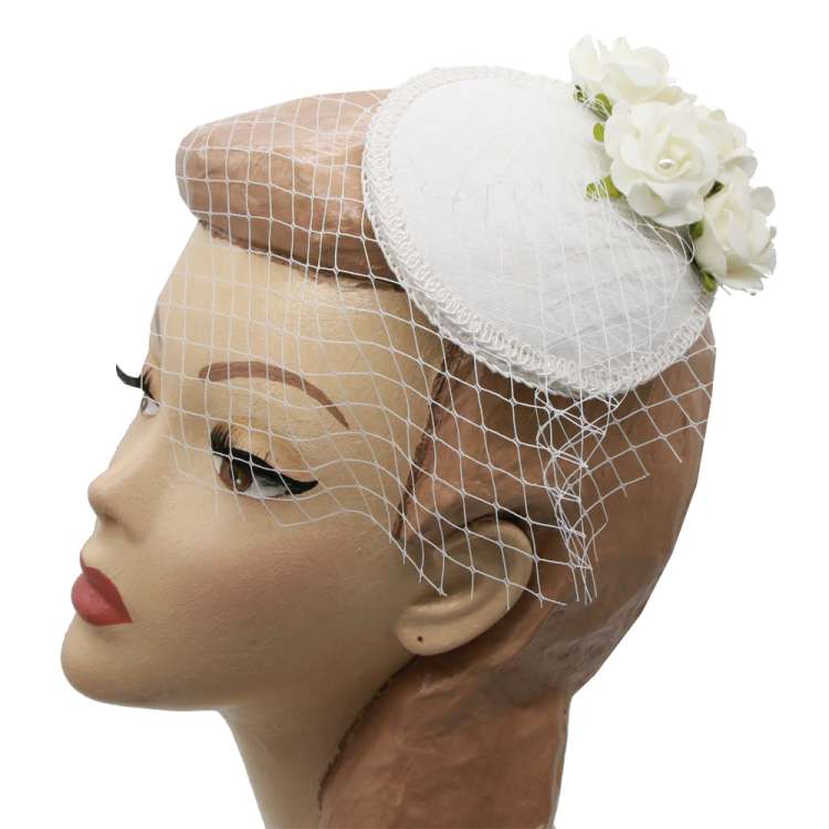 white fascinator with roses and white veil