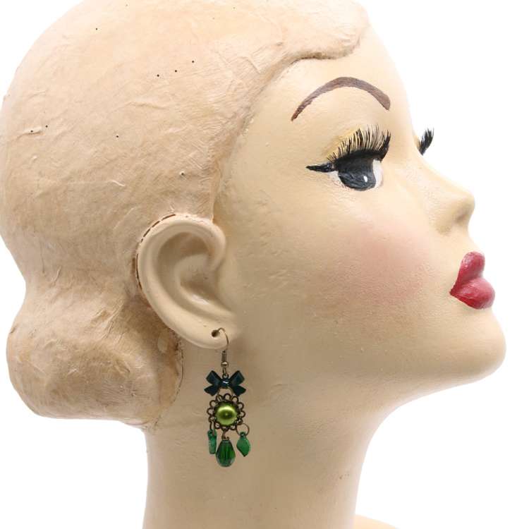 earrings dark green on head