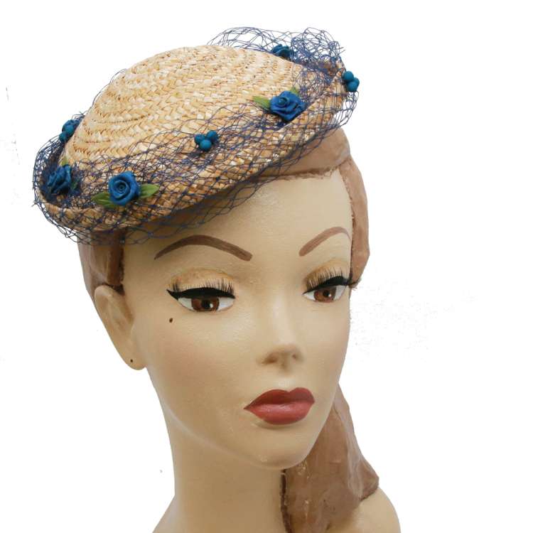 Bowler Straw Hat - Round hat with net and flowers in blue.