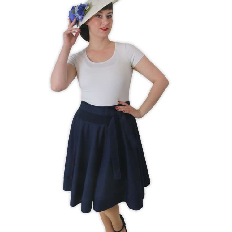 woman in navy blue swing skirt
