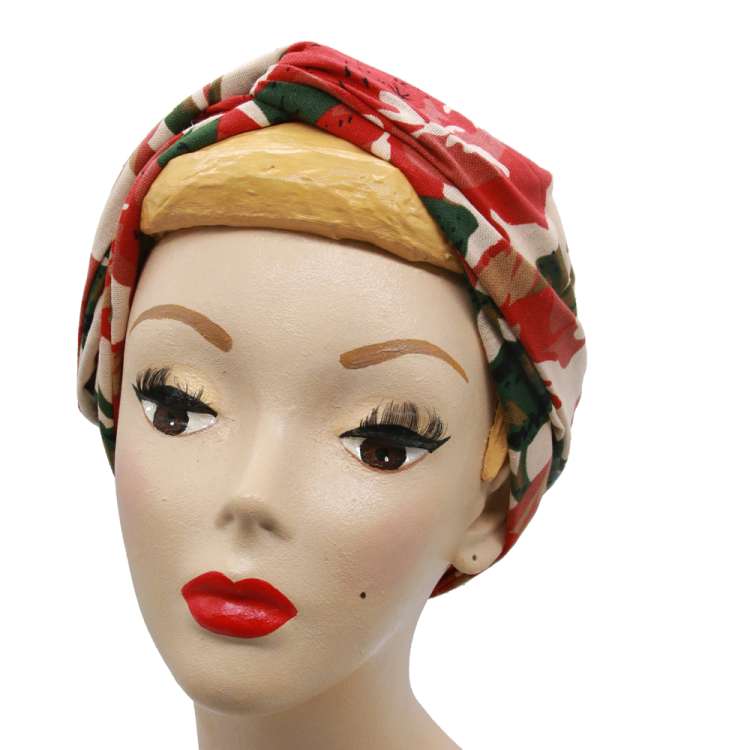 dressed, flat tied: Turban hairband with red flowers