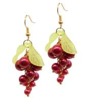 Earrings with shiny red grapes