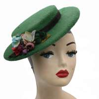Small hat made of wool fabric in dark green - vintage winter hat