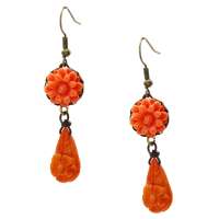 Earrings with flowers and gemstone in orange