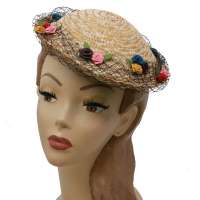 Round straw hat with net and colourful flowers