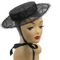 Hat with transparent brim and spider web look