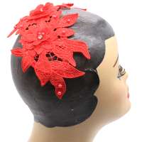 Flat red bandeau half hat made from elegant floral lace